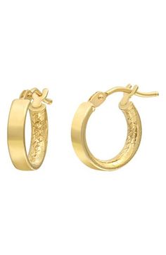 A flat silhouette and textured interior maximize the shine of these handcrafted hoop earrings. 1/2" hoop diameter; 1/8" width Snap-post closure 14k gold Imported Small Hoop Hinged 14k Gold Jewelry, 14k Gold Small Hoop Hinged Jewelry, 14k Gold Hinged Hoop Earrings For Formal Occasions, Elegant Hammered 14k Gold Huggie Earrings, Hammered 14k Yellow Gold Huggie Earrings, Small Hammered Hoop Earrings For Formal Occasions, Gold Hammered Hoop Earrings For Formal Occasions, 14k Gold Small Hoop Huggie Earrings For Formal Occasions, Formal Small Hoop Earrings With Hammered Detail