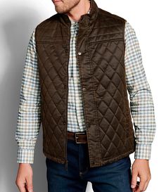 From Johnston & Murphy, this vest features: mixed quilted patternwashed for vintage characterstanding collarsleeveless center zipper closure and snap front placketside entry pocketsmultiple interior pockets.fully lined with printed liningrecycled polyfillcotton/polyesterdry cleanImported. Quilted Vest Outfit, Textile Garments, Mens Vest Fashion, Mens Dress Outfits, Outdoor Jackets, Character Clothing, Mens Outdoor Jackets, Cotton Vest, Mens Fashion Fall