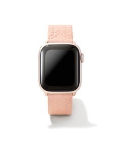 an apple watch with a pink leather band and black screen protector on the front, against a white background