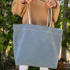 The Quinn Collection is designed to transition with you from season to season. The soft denim shade will add a pop of interest to any neutral outfit. Available in shouldersac, crossbody, and pouch.Material: 100% linen - washed finish Dimensions: 36"x38"x15" Shipping: Items in stock will ship within 2-3 business days. Please see our Shipping terms for more information. Casual Everyday Reversible Canvas Bag, Denim Blue Cotton Bags For Spring, Everyday Denim Blue Canvas Shoulder Bag, Blue Denim Canvas Bag For Everyday Use, Casual Canvas Bag With Cotton Gusset For Daily Use, Denim Blue Cotton Shoulder Bag For Everyday Use, Versatile Cotton Shoulder Bag For Summer, Denim Blue Shoulder Bag For Everyday Summer Use, Denim Blue Shoulder Bag For Summer