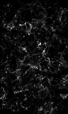 an abstract black and white photo with lots of small lights on the dark background,