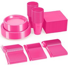 pink plastic tableware and napkins are arranged on a white surface with matching forks