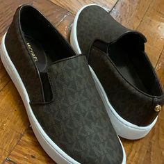 Michael Kors Slip On Sneaker | Brown Sneakers | Brand New, Used Only Once | Women’s Sneaker | Size 5 Michael Kors Slip-on Synthetic Sneakers, Michael Kors Slip-on Sneakers, Michael Kors Leather Slip-on Sneakers, Michael Kors Brown Low-top Sneakers, Michael Kors Slip-on Sneakers With Cushioned Footbed, Michael Kors Slip On, Brown Sneakers, Sneaker Brands, Michael Kors Shoes