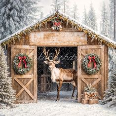 a painting of a deer standing in front of a barn with christmas wreaths on it