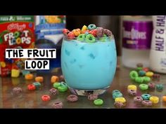 a blue drink with cereal in it and the words, the fruit loop on top