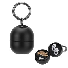 an item is shown in the shape of a ball and keychain with keys inside it