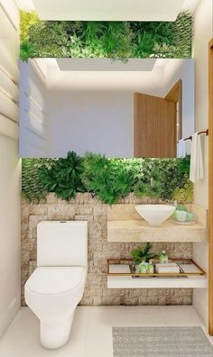 a bathroom with green plants on the walls and ceiling above the toilet, along with a sink