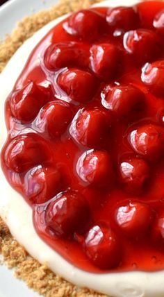 a dessert with cherries on top of it