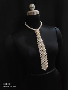 Handmade Ivory Pearl Tie with Golden beads embedded. Elegant Beige Jewelry For Formal Occasions, Elegant Formal Beige Jewelry, Adjustable Cream Necklace For Party, Elegant Beige Necklace For Formal Occasions, Cream-colored Pearl Chain Necklace For Party, Classic Adjustable Pearl Necklace For Party, Cream Pearl Chain Necklace For Party, Elegant Adjustable Pearl Necklace For Formal Occasions, Elegant Cream Pearl Necklace For Formal Occasions