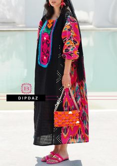 Hand crafted TOPS at DIPDAZ SETS Discover the perfect blend of tradition and contemporary fashion with our Afghan Modern Style Handmade Collared Top. This exquisite piece is a testament to the rich cultural heritage of Afghanistan, meticulously crafted by skilled artisans to bring you an authentic and stylish garment. Features: Handmade Excellence: Each top is handcrafted with attention to detail, ensuring a unique and high-quality piece.  Modern Design: The top features a modern silhouette with Traditional Multicolor Transitional Season Kaftan, Festive Multicolor Kaftan With Woven Motifs, Festive Multicolor Woven Motif Kaftan, Festive Multicolor Woven Motifs Kaftan, Festive Handloom Kaftan For Festivals, Festive Handloom Kaftan, Bohemian Handloom Kaftan For Festive Season, Bohemian Handloom Kaftan For Festive Occasions, Folk Style Woven Motifs Kaftan For Eid