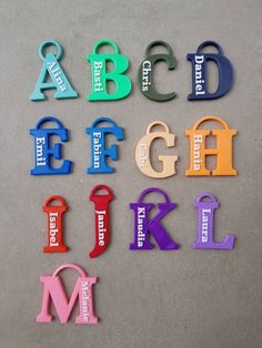 the letters are made out of plastic and have different colors, shapes, and sizes