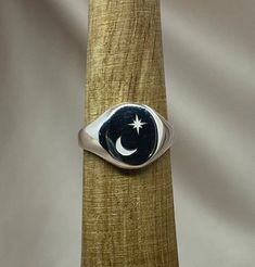 This beautiful moon ring takes its inspiration from the night sky with a unique design that will inspire many. The genuine silver  will attract freedom, independence and cosmic awareness. Perfect gift for your loved one.  FEATURES: * silver moon ring * unique artisan design * free gift wrap * free international shipping SIZE: This ring is approx 10mm by 12mm on top. Standard size for all rings is 7US. This size fits most adults but all of our rings can be changed. Please select customize at chec Moon Engraving, Moon And Stars Ring, Silver Moon Ring, Engraving Ring, Ring Moon, Moon And Star Ring, Silver Signet Ring, Moon Ring, Gold Signet Ring