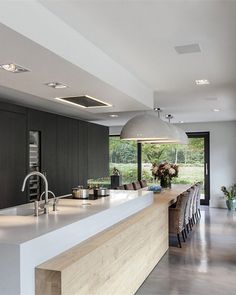 the kitchen is clean and ready to be used as a dining room or office area