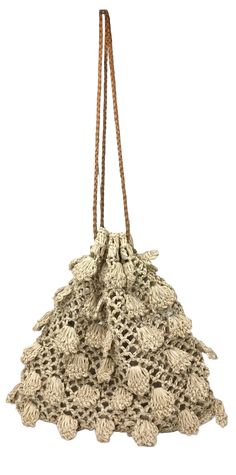 Indulge in luxury with our Cepha (Natural) bag. This unique raffia crochet bag features a delicate petal pattern, adding a touch of elegance to your ensemble. Its drawstring design allows for easy access to your essentials while its natural color complements any outfit. The perfect accessory for any sophisticated and exclusive look. 80% raffia / 10% leather / 10% polyester Dimensions L/W/H: 8.5 x 2 x 8.5 inches Made in the Philippines. Raffia Crochet Bag, Raffia Crochet, Swimming Bag, Color Complement, Gift Card Sale, The Philippines, Travel Gifts, Resort Wear, Sock Shoes