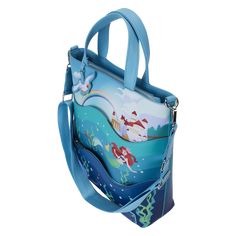 The Little Mermaid 35th Anniversary Life Is The Bubbles Tote Bag. Celebrate 35 years of Disney's The Little Mermaid with this The Little Mermaid 35th Anniversary Life Is The Bubbles Tote Bag! The faux leather tote bag features applique and printed details - plus a Scuttle faux leather charm! Graphics include Ariel and friends Sebastian and Flounder under the sea with Ursula lurking in the deep. Complete with Prince Eric's castle in the background, this bag measures approximately 13-inches tall x Ariel Ursula, Flounder And Sebastian, Life Is The Bubbles, Disney The Little Mermaid, Girls Personalized Gifts, Vegan Leather Tote Bag, Loungefly Bag, Mermaid Life, Vegan Leather Tote