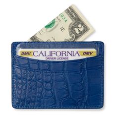 Our luxe classic credit card case wallet expertly crafted in a cool cobalto blue genuine American alligator leather. Features front and back dual credit card slots and a discreet interior calfskin lined center pocket. The slim rectangular design is an elegant choice to safeguard your essential cards and bank notes. Genuine American alligator Vibrant cobalto blue color Matte alligator leather 4 exterior card slots; calfskin lined center pocket Rounded and polished edges Size: 4" L. x 3" H. Foil e American Alligator, Card Case Wallet, Credit Card Wallet, Luxury Gifts, Bank Notes, Card Case, Card Wallet, Alligator, Card Slots