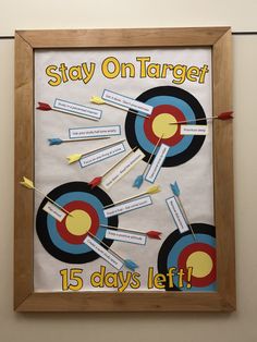 a bulletin board with arrows on it that says, stay on target 15 days left