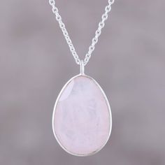 Centering this pendant necklace, a single egg of glistening rose quartz weighs eight carats. Neetu Barathi designs this necklace from India, which features faceted gems of rose quartz and smoky quartz along its sterling silver cable chain. Rose Quartz Gemstone Pendant Jewelry, Rose Quartz Gemstone Pendant Necklace, Large Stone Round Necklace, Round Necklaces With Large Stone, Pink Teardrop Gemstone Necklace, Rose Quartz Teardrop Jewelry, Rose Quartz Pendant Necklace With Gemstones, Elegant Faceted Rose Quartz Necklace, Elegant Rose Quartz Faceted Necklace