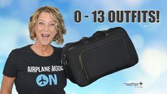 a woman holding a black suitcase with the words airplane mode on it