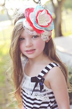 "Headband game strong! 💪 Behold the queen of the garden party with our oversized floral headband. Each satin petal is handmade with care, and our feather and rhinestone embellishments are like the cherry on top of your favorite sundae. Because your noggin deserves nothing less than a crown. And don't worry, our soft lace headband is stretchy enough to fit your genius brain. Blossom in style, lovelies!  ♥ Spot clean ♥ all ages, 15\" circumference  ♥ Piece is approximately 7\" x 5\" ♥ Due to each Whimsical Summer Headband With Handmade Flowers, Whimsical Headband Hair Accessories, Whimsical Spring Hair Accessories With Matching Headband, Summer Flower Headpiece With Matching Headband, Summer Flower Headband For Garden Party, Summer Adjustable Handmade Flowers Headband, Handmade Flower Headband For Summer, Handmade Flower Hair Accessories For Summer, Summer Adjustable Headband With Handmade Flowers