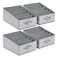 three grey storage boxes with handles and drawers on each side, one is open and the other two are closed