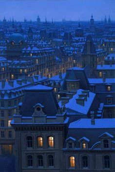 the city is covered in snow and lit up by lights from windows at night time