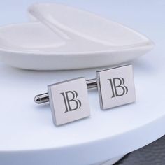 These classicaclly customized cufflinks are a great gift for any man. They look great on the groom, groomsman, or father of bride or groom! Each cufflink is engraved with a single initial. CUSTOM ENGRAVING: BOTH CUFFLINKS: [Initial] DETAILS: MATERIAL: stainless steel SHAPES: round or square FINISHES: gold, gunmetal, rose gold, stainless steel DIMENSIONS: 5/8 inch Classic Rectangular Wedding Cufflinks, Elegant Engraved Cufflinks For Business, Elegant Engraved Cufflinks For Anniversary, Elegant Adjustable Cufflinks For Father's Day, Elegant Business Jewelry With Initials, Luxury Personalized Business Jewelry, Timeless Silver Cufflinks For Wedding, Elegant Rectangular Cufflinks For Father's Day, Classic Personalized Jewelry For Business