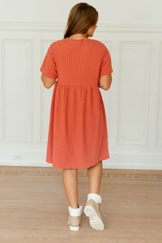 Feel comfortable without sacrificing style in this modest length midi dress that is perfect for the late summer season! The unique textured knit fabric makes the 'Reese' standout, while still maintaining the classic t-shirt dress style. Layer with a sweater for a cozy look, or add a denim jacket for an elevated chic! 93% Polyester, 7% Spandex Unlined Hand Wash Cold Separate Hang or Lay Flat to Dry Do Not Bleach Low Iron If Needed Maternity/Bump Friendly! FINAL SALE: NOT ELIGIBLE FOR RETURN OR EX Shirt Dress Style, Layered Tops, Knit Midi, Knit Midi Dress, Low Iron, Late Summer, Textured Knit, Skirt Leggings, Relaxed Style