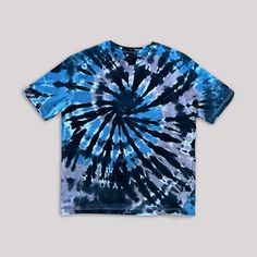 High quality tie-dye short sleeves t-shirt with blue black and brown shades. 100% ORGANIC RING-SPUN COMBED COTTON tee is hand dyed with vegan, biodegradable high quality dyes, which will not fade or bleed in the wash. T-Shirt is relaxed fit, unisex. Best gift for friends and family. SIZING All our T-Shirts are relaxed fit. Our recommendations: oLooser fit - your regular size oOversized fit - up one size The female model is 182 cm, 5,97 ft wearing size XL. The male model is 191 cm, 6,26 ft wearing size XL. PRODUCTION AND DELIVERY TIMES We are a small business, and we are trying to be as sustainable as possible. We do not hold a lot of products in stock, and we tie-dye them only after the order is received. Please give us 1-6 business days to produce your ordered pieces.  Delivery times: It Trendy Hand Dyed Crew Neck T-shirt, Trendy Hand Dyed Short Sleeve T-shirt, Casual Black Tops With Batik Print, Tie-dye Short Sleeve T-shirt For Streetwear, Trendy Tie-dye Short Sleeve T-shirt, Trendy Tie Dye Short Sleeve T-shirt, Trendy Tie Dye T-shirt With Relaxed Fit, Trendy Tie-dye Relaxed Fit T-shirt, Trendy Tie Dye Relaxed Fit T-shirt