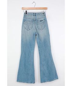 It's a breeze to style the Rolla's Eastcoast Light Wash Distressed High-Rise Flare Jeans! Distressed non-stretch denim (in Rolla's Sofia Worn wash) shapes a high-rise waistband with belt loops above diagonal front pockets, back patch pockets, and flared pant legs with plenty of distressing. Branded top button and hidden zip fly. Grab your platform heels and favorite tee and you're ready to groove in chic, throwback style! Unlined. 100% Cotton. Machine Wash Cold. Imported. Fit: This garment fits Jeans Distressed, Warm Jacket, Back Patch, Pj Sets, Platform Heels, Bell Bottom Jeans, Flare Jeans, Stretch Denim, Stay Warm