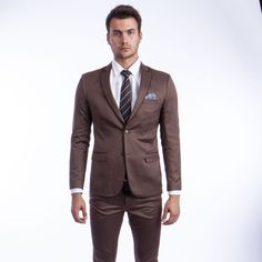 Elevate Your Style And Make A Statement With The Sean Alexander 2-Piece Suit Set, A Harmonious Blend Of Timeless Elegance And Contemporary Sophistication. Crafted With Meticulous Attention To Detail, The Suit Features A Sleek, Solid-Color Design, A Skinny Fit For A Tailored Silhouette, And A Host Of Convenient Features Like Underarm Sweat Guards, French Facing, And Ample Pockets In The Jacket. The Matching Pants Offer Comfort And Style With A Flat Front, Lined To The Knee, And Secure Fastening. Brown Slim Fit Sets For Semi-formal Occasions, Professional Semi-formal Fitted Sets, Professional Fitted Sets For Semi-formal Occasions, Fitted Professional Sets For Semi-formal Occasions, Slim Fit Sets With Suit Collar For Office Wear, Brown Slim Fit Notch Lapel Set, Brown Fitted Business Sets, Fitted Semi-formal Set With Suit Collar, Brown Tailored Sets With Suit Collar