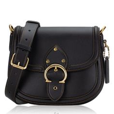 Nwt Coach Glovetanned Leather Beat Saddle Bag With Webbing Strap Black/Gold Sold Out !! Timelessly Stylish And Ultra Versatile, This Coach Leather Saddle Bag Comes With An Interchangeable Webbing Strap For Added Styling Options. Small Sized Bag; 9"W X 7-1/2"H X 2-1/4"D (Width Is Measured Across The Bottom Of Handbag); 1.95 Lbs. Approx. Weight Silhouette Is Based Off 5'9" Model 21-1/2"L Adjustable Crossbody Strap; Includes Interchangeable Webbing Strap With 25" Drop Snap Closure Brass-Tone Exteri Crossbody Bag With Brass Hardware In Calf Leather, Calf Leather Crossbody Bag With Brass Hardware, Luxury Saddle Shoulder Bag With Brass Hardware, Designer Black Leather Saddle Bag, Black Leather Saddle Bag With Gold-tone Hardware, Luxury Black Saddle Bag With Gunmetal Hardware, Coach Black Satchel For Fall, Black Coach Satchel For Fall, Crossbody Saddle Bag With Brass Hardware For Work