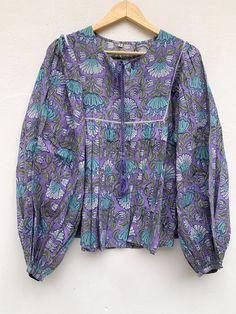 "ITEM DESCRIPTION cotton purple & turquoise lotus hand block print women's blouse / boho tunics tops / hippie blouse Features : Long sleeve, V neck, Blouse Material : Cotton Cambric, Hand Block Printed Fabric: 100% cotton soft light weight ethnic print fabrics Sleeve Length = 22 inch For more sizes & their measurement, please refer our below chart to understand the sizes variations available with us For your size requirement, please mention your size in seller note at the time of buying. Hippie Blouse, Boho Tunic Tops, Purple Turquoise, Bohemian Maxi Dress, Ethnic Print, Long Dress Casual, Boho Tunics, Blouse Material, Hand Block Print