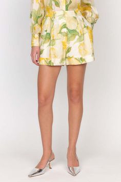 The lola short is cut in christy lynn's signature linen quality and waterlily yellow print. this short is designed to be high-waisted with pleats at the font the give a flared look. complete with a elastic back for comfort.    composition: 100% linen  care: dry clean only  imported. Romantic Woman, The Font, Blue Flats, Yellow Print, Lace Making, Water Lilies, Designer Outfits Woman, Fabric Material, Wide Leg Pants