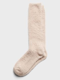 Cozy socks get even better thanks to a special eyelash yarn, which adds softness, stretch, and a fuzzy look.  Hits below the calf. Cozy Soft Snug Knee-high Socks, Cozy Snug Fit Soft Knee-high Socks, Sleepover Inspiration, Calf Machine, Eyelash Yarn, Exchange Student, Fuzzy Socks, Get Even, Cozy Socks