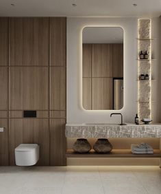 a modern bathroom with wooden cabinets and marble counter tops