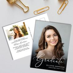 a graduation announcement card with a photo on it and some paper clips next to it