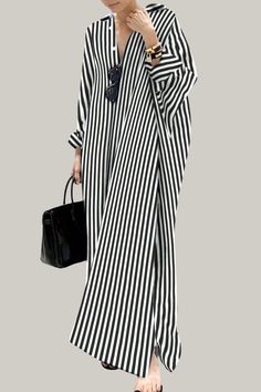 Effortlessly stylish and sophisticated, this striped oversized shirt dress is perfect for the warmer seasons. With a button front, a split neckline, and a high waistline, it exudes elegance and class. The long sleeves and drop shoulder design add a touch of artistry, while the straight hem and non-stretch fabric provide a luxurious finish. Perfect for the fashion-forward and discerning consumer. 95% Polyester, 5% Elastane Please allow 3-5 business days to process and ship. Product Measurements in cm : Size US Bust Length Sleeve Length Cuff S 4 90 130 72 31 M 6 94 131 73 32 L 8/10 100 132 74 33.5 XL 12 106 133 75 35 Spring Oversized Shirt Dress With Roll-up Sleeves, Vacation Striped Button-up Shirt Dress, Striped V-neck Shirt Dress For Beach, Casual Striped V-neck Shirt Dress, Chic Striped Long-sleeve Shirt Dress, Bandage Jumpsuits, Oversized Shirt Dress, Long Shirt Dress, Plus Size Jumpsuit