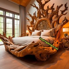 a bed made out of tree branches in a room with wood flooring and large windows