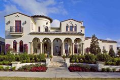 a large white house with lots of windows