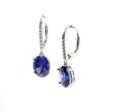 Beautiful 10X8mm Oval AAA Lab Created Tanzanite Lever Back Earrings. With Pave Set White Sapphire Accents. Solid .925 Sterling Silver Limited Time Promotion Priced Wrapped & ready to give in a Laced Blue Gift Box Fast Free Shipping From South Florida, Blue Gift, Leverback Earrings, Dangling Earrings, White Sapphire, Fine Jewellery Earrings, South Florida, New Style, Limited Time, Jewelry Earrings Dangle