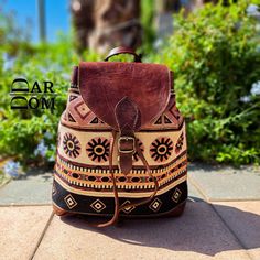 Moroccan Leather Backpack Vintage Leather Backpack Handmade Backpack Brown Backpack ## Product Characteristics ## -Dimension : (13.77H * 11.41W)inch  [35 cm H * 29 cm W ] -Color : Dark Brown -Material: 100 % Goat leather -100% Handmade - This backpack is handcrafted from high quality goat leather. The leather we use is treated with natural materials that make the leather has no unpleasant smell. This backpack is the best choice for your travels, because it is very durable and can withstand heavy weights. ##Note ## We still need your phone number for the shipping company can you please send it! Vintage Leather Backpack, Handmade Leather Backpack, Brown Backpacks, Handmade Backpacks, Moroccan Leather, Goat Leather, Backpack Purse, Vintage Leather, Leather Backpack