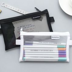 SPECIFICATIONSUse: Schools & OfficesType: pencil caseSize: 19.5cm*12cmOrigin: CN(Origin)Novelty: YesMaterial: NylonCategory: Pencil BagBrand Name: CyflymderMaterial : NylonColor : Black , White , GraySize : About: 19.8cm * 12cm , 20.5cm * 9cm White Pencil Case For Back To School, White Stationery For Back To School, White Zipper Pouch Stationery For Organization, Black Rectangular Case Stationery For School, Black Rectangular Pencil Case For Back To School, White Pencil Case For Back To School Organization, White Stationery Zipper Pouch For Organization, White Stationery With Pen Holders For Organization, Black Portable Pencil-shaped Pencil Case