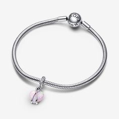 Celebrate your mom with the Pandora Mum Opalescent Heart Dangle Charm. Crafted in sterling silver, this heart-warming charm features a heart-shaped pink lab-created opal, adorned with a spectrum of coloors and glittering streaks. The intricate design features overlapping silver lines forming a jump ring, a delicate heart-shaped disc engraved with 'Mom,' and a row of pavé for added shine. Celebrate the beauty of motherhood with a charm that captures its richness and multi-faceted stories. - Pandora Mom Opalescent Heart Dangle Charm - Sterling silver / Mixed stone / Pink Sterling Silver Heart Jewelry With Charms, White Gold Heart Charms In Sterling Silver, White Gold Sterling Silver Heart Charms, Elegant Heart Charms For Mother's Day, Sterling Silver Heart Charms, Pink Sterling Silver Jewelry With Charms, Elegant Nickel Free Heart Charms, Pink Jewelry With Sterling Silver Clasp As Gift, Pink Heart Pendant Jewelry As Gift For Mom