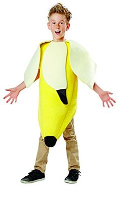 a young boy dressed in a banana costume