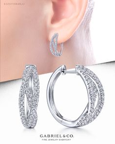 14K White Gold Twisted 15mm Diamond Huggie Earrings. EG13713W45JJ #GabrielNY #DiamondJewelry #FineJewelry#FineJewelry#FashionJewelry#UniqueJewelry#GiftIdeas#UniqueGifts #Earrings #FashionEarrings #HuggieEarrings Classic Sterling Silver Earrings With Timeless Design, Elegant Huggie Clip-on Earrings, Silver Earrings With Timeless Design For Anniversary, Elegant Silver Huggie Diamond Earrings, Elegant Sterling Silver Huggie Earrings Round Cut, Elegant Silver Wrap Earrings For Anniversary, Luxury Timeless Silver Earrings, Luxury Timeless Design Earrings Gift, Diamond Earrings For Gifts