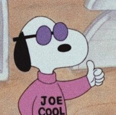 a cartoon dog with sunglasses giving the thumbs up