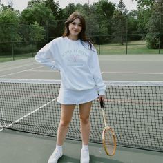 Serve up some style with this cute and classy tennis club crew. This classic style is perfect for a day on the court or just sipping some lemonade at your local country club. Pair with a cute tennis skirt or our simple belt bag for the perfect preppy outfit. This white crew will have your sorority name embroidered in green thread about two cute tennis rackets and your sorority's established date on either side. Model is wearing a size large White crew with bright pink and green embroidery Preppy Spring Tennis Skirt For School, Preppy Tennis Skirt For Summer, Preppy Summer Tennis Skirt, White Preppy Tennis Dress For Spring, Casual White Tennis Dress, White Preppy Tennis Skirt For School, Preppy Tennis Dress For Spring, Preppy Spring Tennis Dress, Spring Preppy Tennis Dress