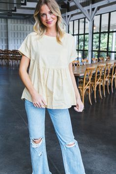 Get ready to rock that babydoll look with our Luciana top! Designed with an oversized fit, this cotton top features short sleeves, a round neck, and a handy chest pocket. Perfect for a playful and effortless style! General Info: 70% Cotton, 30% Linen Hand Wash Cold; Line Dry Babydoll Style Oversized Short Sleeves Round Neck Chest Pocket Back Button Closure Fit Guide: Shape & Fit: Relaxed, Oversized Fabric Elasticity: No Stretch Fabric Texture: Linen Blend Model Info: Height: 5’10” | Bust: 32" | Waist: 24" | Hip: 34” | Size Shown: Small Spring Yellow Tops With Pockets, Spring Cotton Short Sleeve Top For Casual Gatherings, Cotton Short Sleeve Blouse With Pockets, Cotton Crew Neck Short Sleeve Top For Day Out, Cotton Blouse With Pockets And Short Sleeves, Cotton Blouse With Short Sleeves And Pockets, Cotton Tops With Side Pockets For Summer, Spring Casual Tops With Pockets, Relaxed Fit Short Sleeve Blouse With Pockets