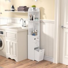 a washer and dryer sitting next to each other in a room